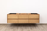 Custom made modern double sink floating bathroom vanity in oak wood, wall mounted and wall hung design, perfect for vessel sinks. Floating vanity with soft-close drawers. Quartz countertop not included.