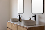 Custom made modern double sink floating bathroom vanity in oak wood, wall mounted and wall hung design, perfect for vessel sinks. Floating vanity with soft-close drawers. Quartz countertop not included.