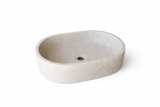 Oval marble vessel sink made from natural stone, modern countertop bathroom sink