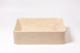 Rectangular concrete vessel sink in sand travertine color