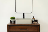 Rectangular concrete vessel sink made from GFRC with smooth finish – modern bathroom washbasin