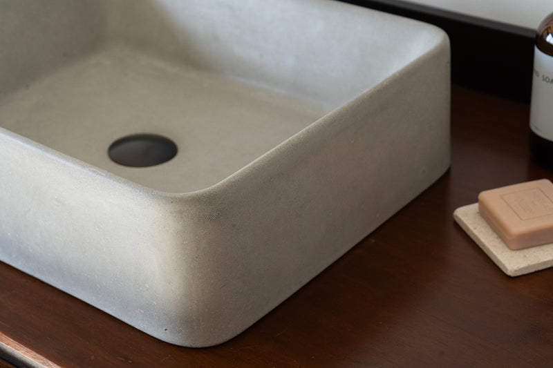 Rectangular concrete vessel sink made from GFRC with smooth finish – modern bathroom washbasin