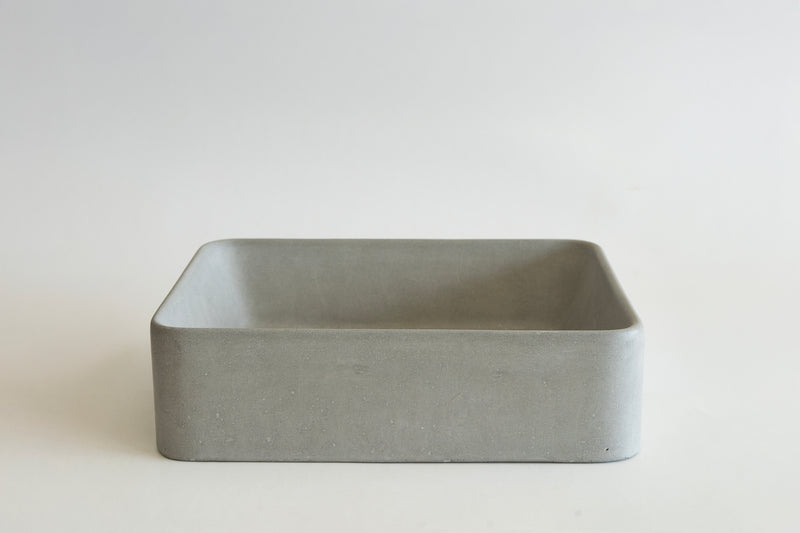 Rectangular concrete vessel sink made from GFRC with smooth finish – modern bathroom washbasin