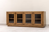 Oak wood sideboard credenza buffet cabinet with wood-framed glass doors and interior shelf, perfect for elegant dining room or living room storage.